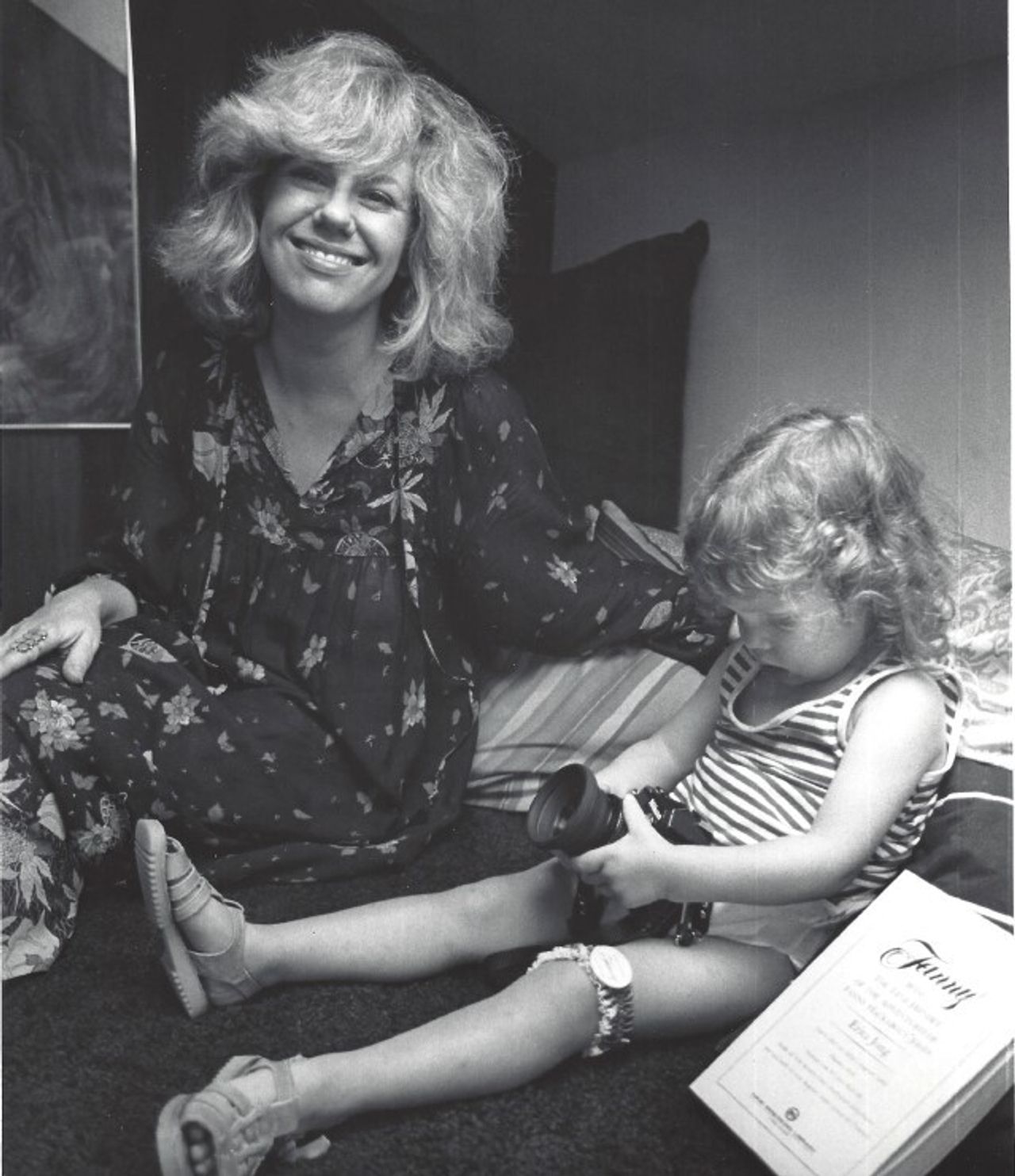 Jong-Fast playing with a camera as a young child, alongside her mother, Erica. (Courtesy Molly Jong-Fast)