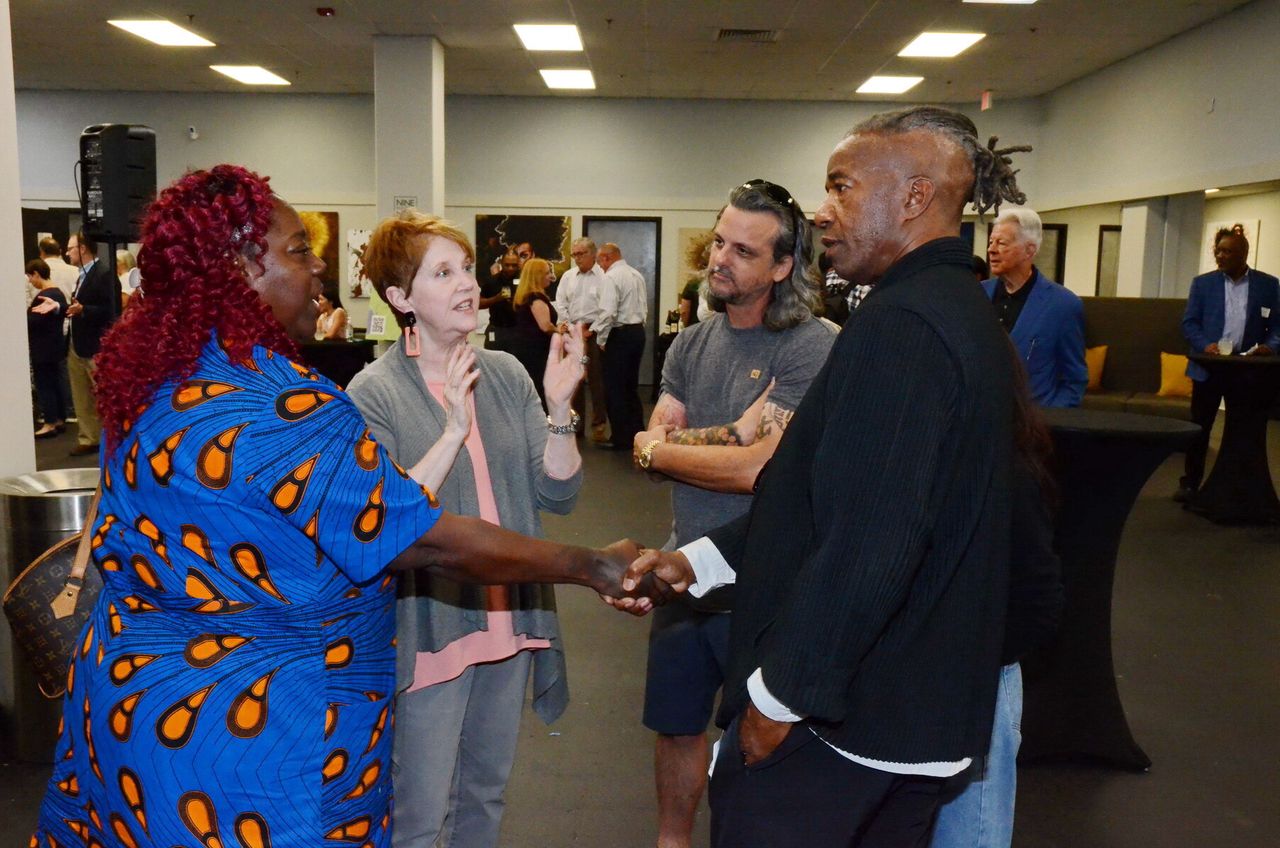 Hood (far right) speaking with attendees of the McColl Park community engagement open house. (Courtesy Walter Hood)