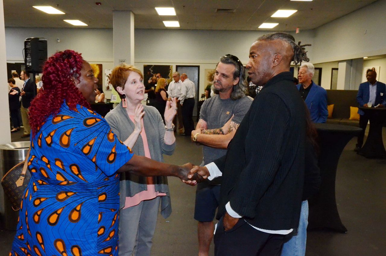Hood (far right) speaking with attendees of the McColl Park community engagement open house. (Courtesy Walter Hood)