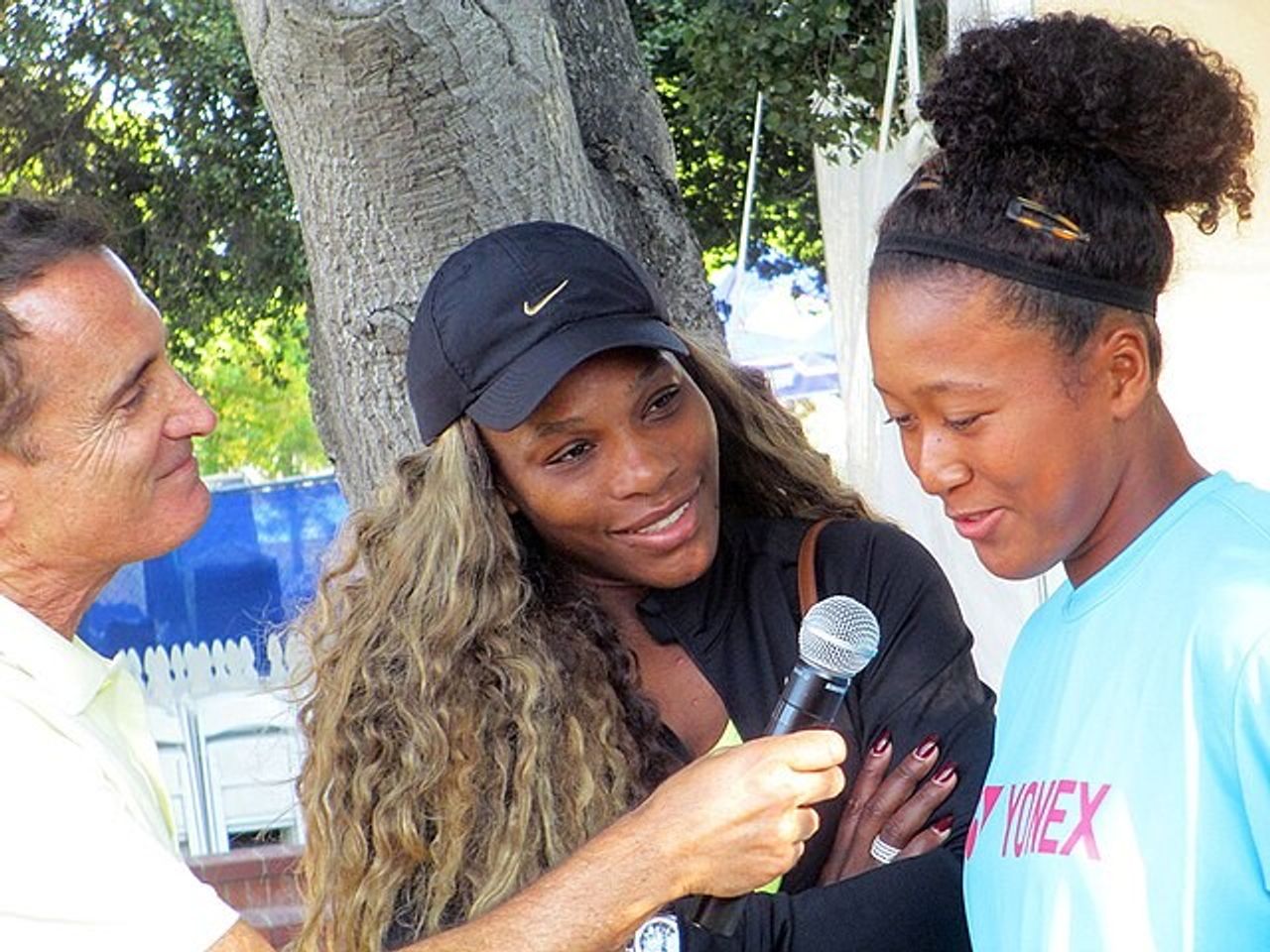 Osaka being interviewed with Serena Williams at the 2014 Bank of the West Classic.