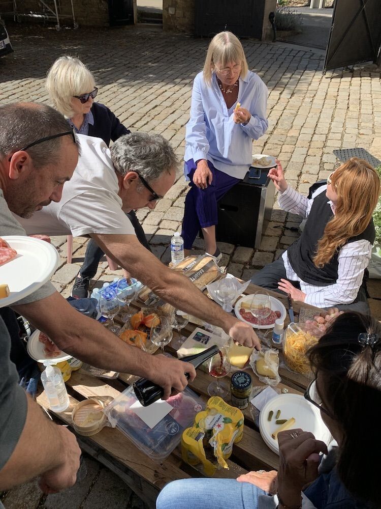 Robinson (middle) at a picnic in Dujac, France. (Courtesy Jancis Robinson)