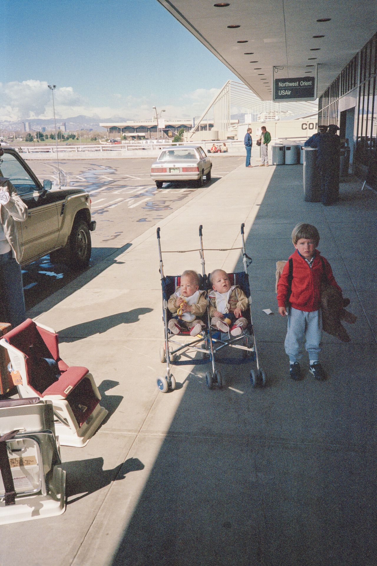 Spencer (left), Trent (middle), and Brandon (right) at Stapleton Airport in Denver before boarding a flight.
