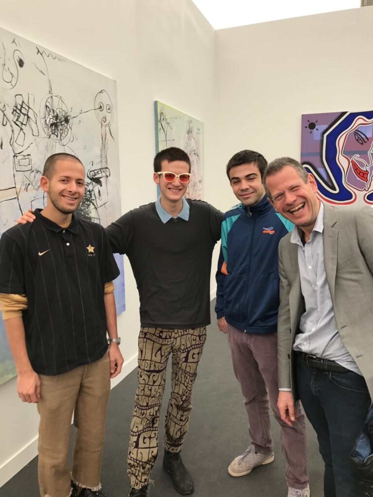 Schachter (right) with his sons Adrian (left) and Kai (center left), and their friend Caio Twombly (son of artist Cy Twombly, center right). (Courtesy Kenny Schachter)