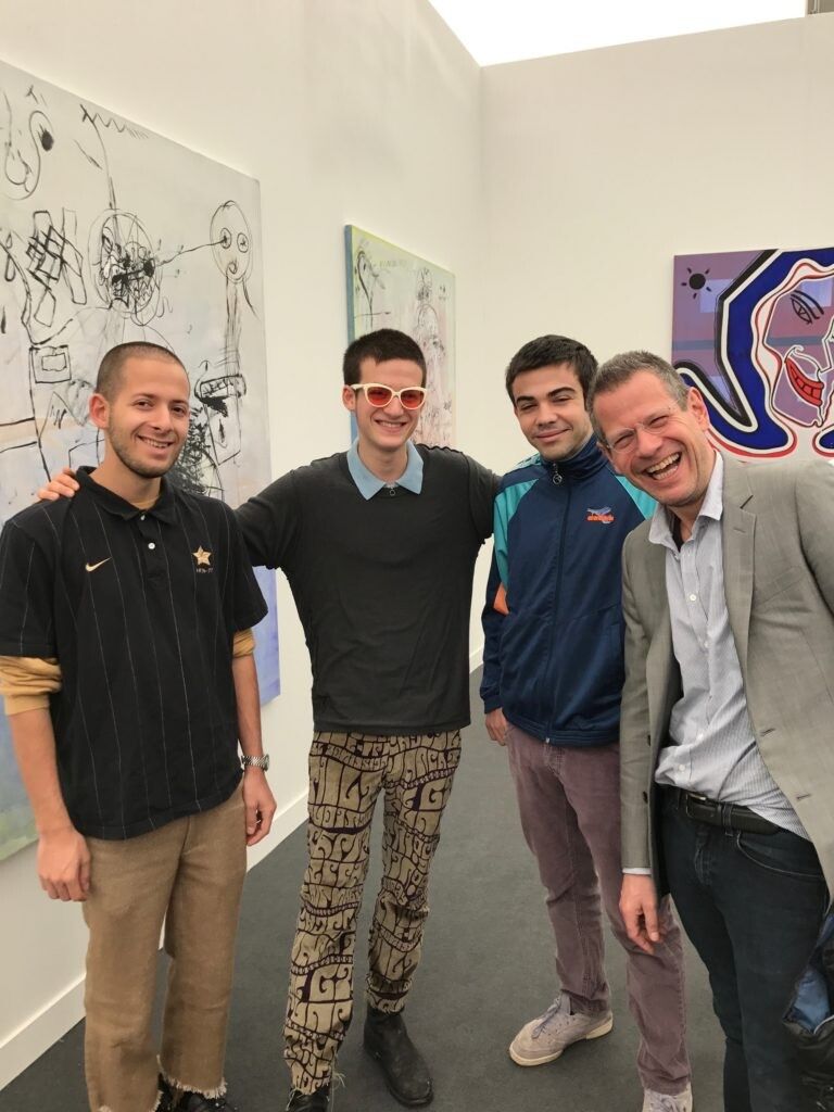 Schachter (right) with his sons Adrian (left) and Kai (center left), and their friend Caio Twombly (son of artist Cy Twombly, center right). (Courtesy Kenny Schachter)