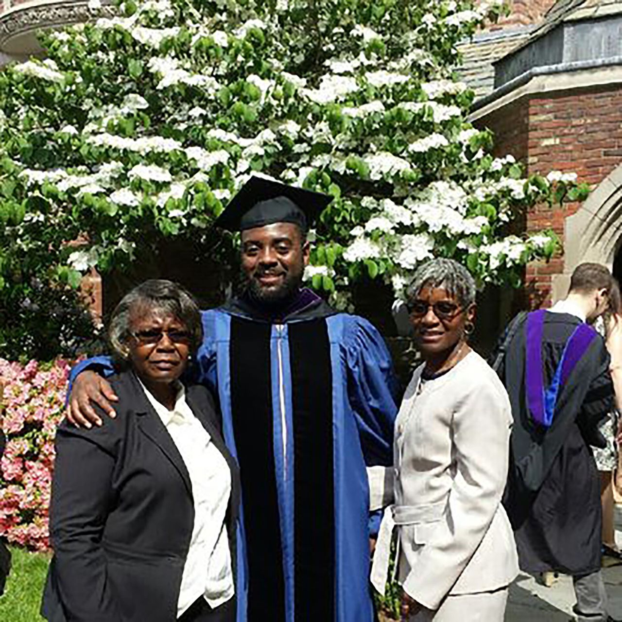 Betts with his mother, Gloria (left), and grandmother, Lily (right), at his graduation from Yale Law School in 2016. (Courtesy Reginald Dwayne Betts)