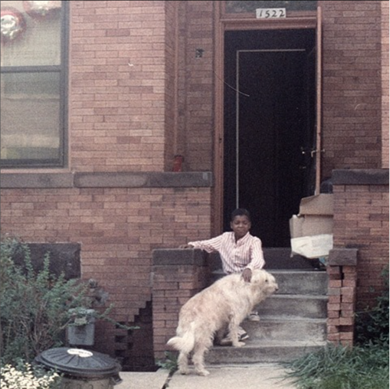Thurston as a child on the steps of his house on Newton Street in Washington, D.C. (Courtesy Baratunde Thurston)