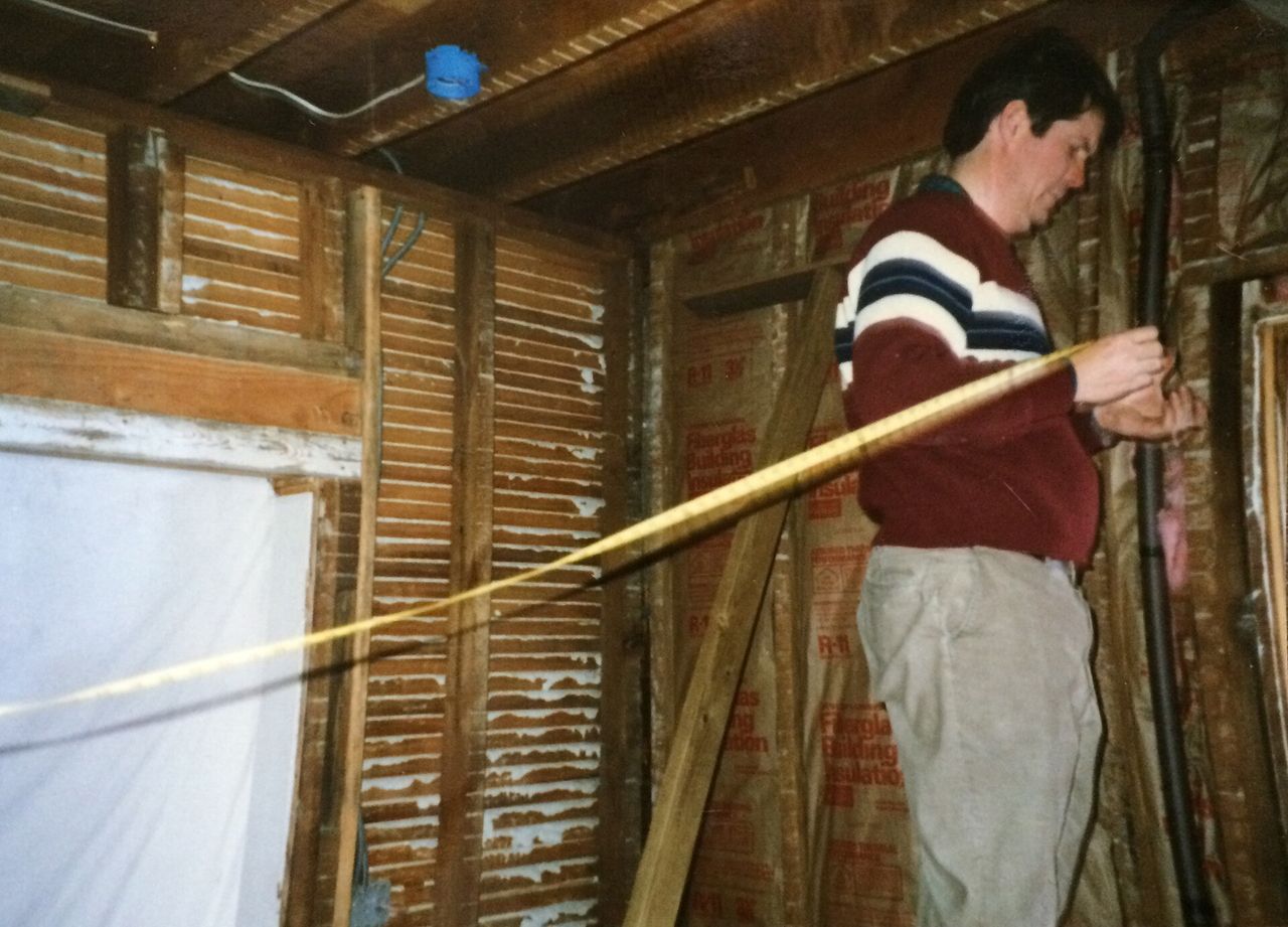 Murphy’s father restoring the family’s home in Poughkeepsie, New York. (Courtesy Michael Murphy)