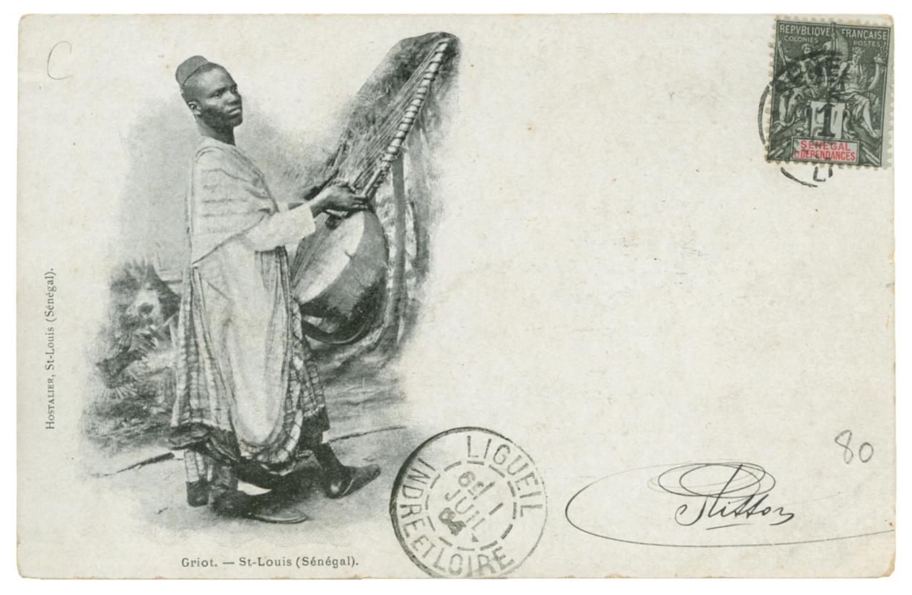 A postcard depicting a griot in Saint Louis, Senegal, as featured in Vintage Postcards from the African World (2020) by Jessica B. Harris. (Courtesy the University Press of Mississippi)