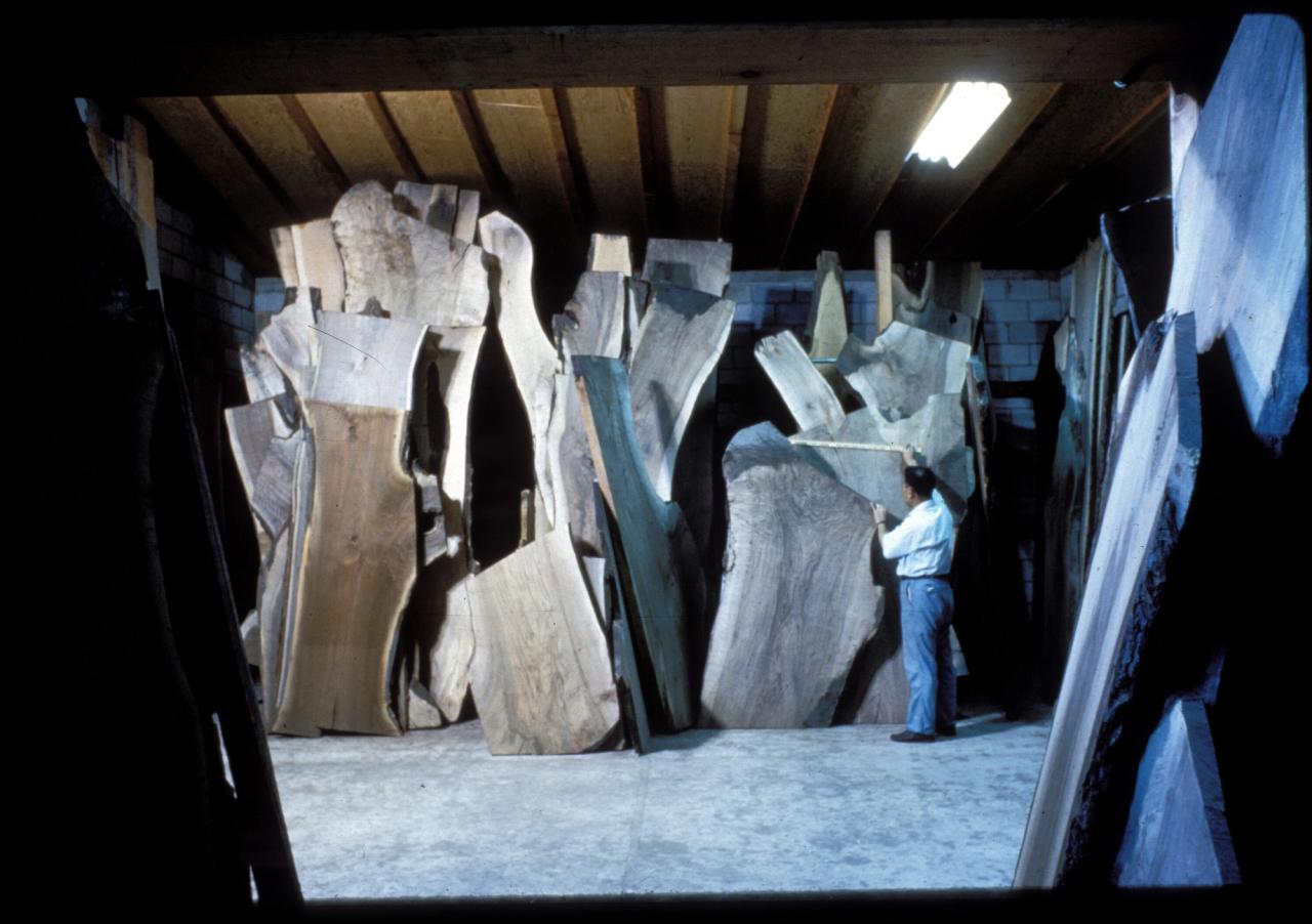 George measuring wood in the studio at the George Nakashima Woodworkers complex in New Hope, Pennsylvania. (Courtesy of Nakashima Foundation for Peace © Ezra Stoller / Esto)