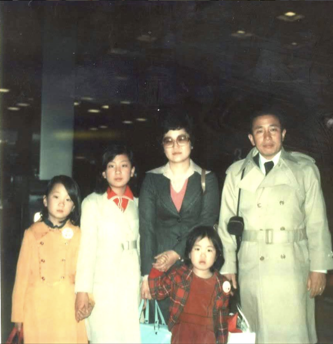 Lee (left) as a child arriving in the United States with her family for the first time in March 1976. (Courtesy Min Jin Lee)