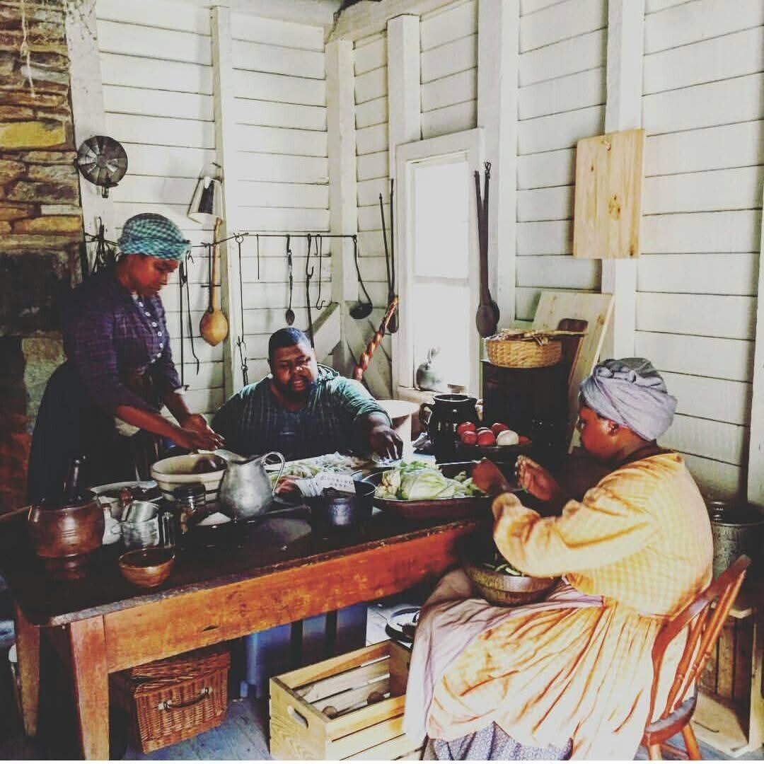 Twitty with fellow historical interpreters, Jasmine and Alex, at the Atlanta History Center. (Photo: J.W. Dillow)