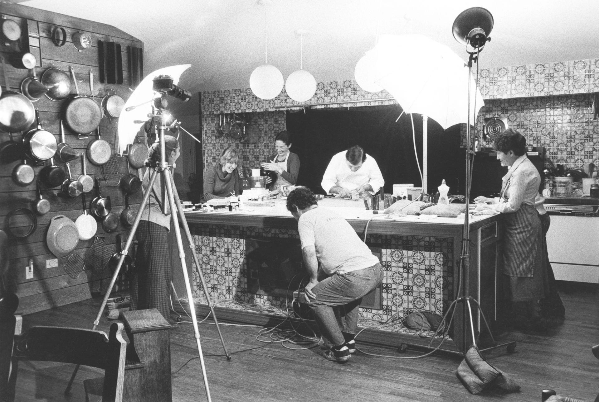 Shooting the photographs for Everyday Cooking with Jacques Pépin in his home kitchen with (L-R) Ann Bramson, his editor at Harper & Row; his wife, Gloria; and photographer Léon Perer in 1982. (Courtesy Jacques Pépin)