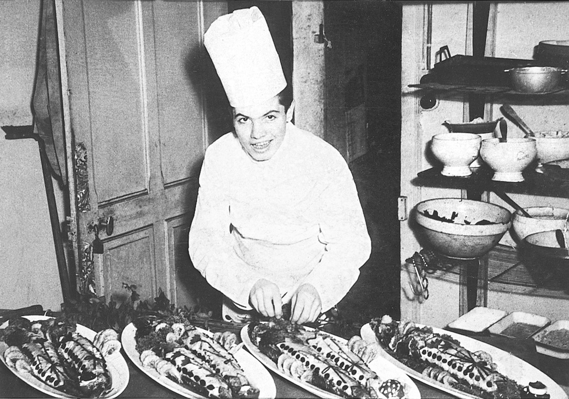 Pépin at 16, as shown in a newspaper photograph, with the banquet he prepared for the Fireman’s Ball in Bellegarde, France. (Courtesy Jacques Pépin)