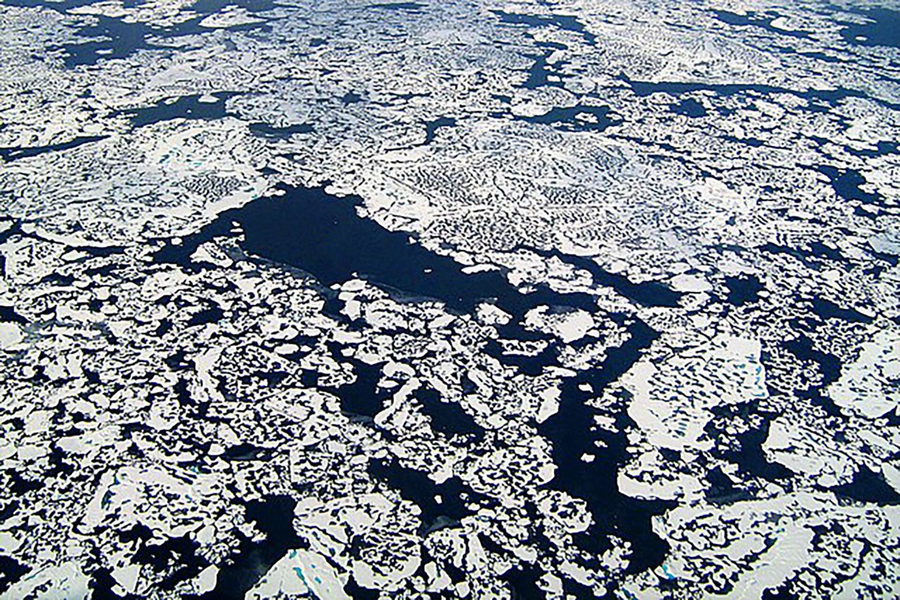 An image depicting methane leaking through cracks in the Arctic ice cap, a phenomenon which contributes to global warming. (Courtesy NASA)