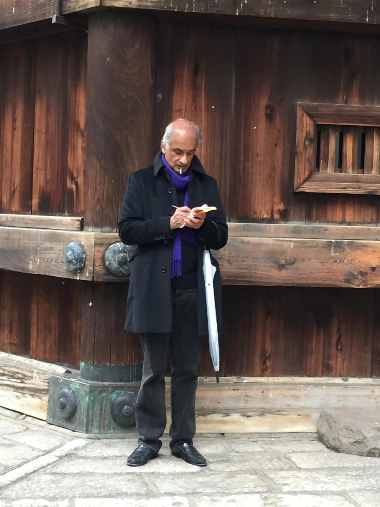 Iyer writing in Japan. (Courtesy Pico Iyer)