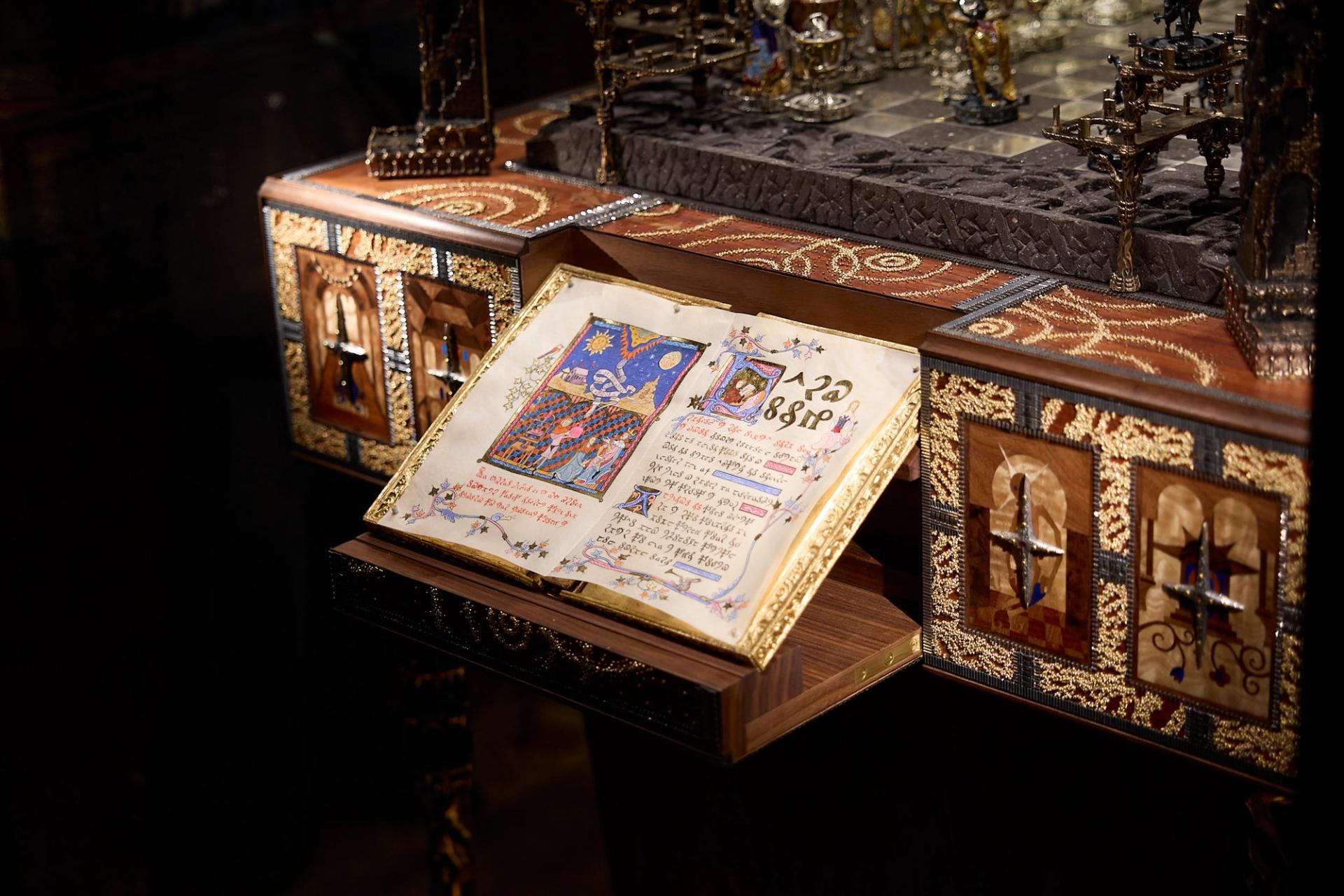 Detail of Joseph Arzoumanov’s “L'Échiquier des Songes” (2026) made with gold, silver, precious and semi-precious stones, mother of pearl, gold and silk embroidery, Armenian volcanic stone, wood marquetry, calfskin parchment, Murano glass, bronze, steel, robotic components. (Photo: Antonio Campanella for The Slowdown/Courtesy the artist)