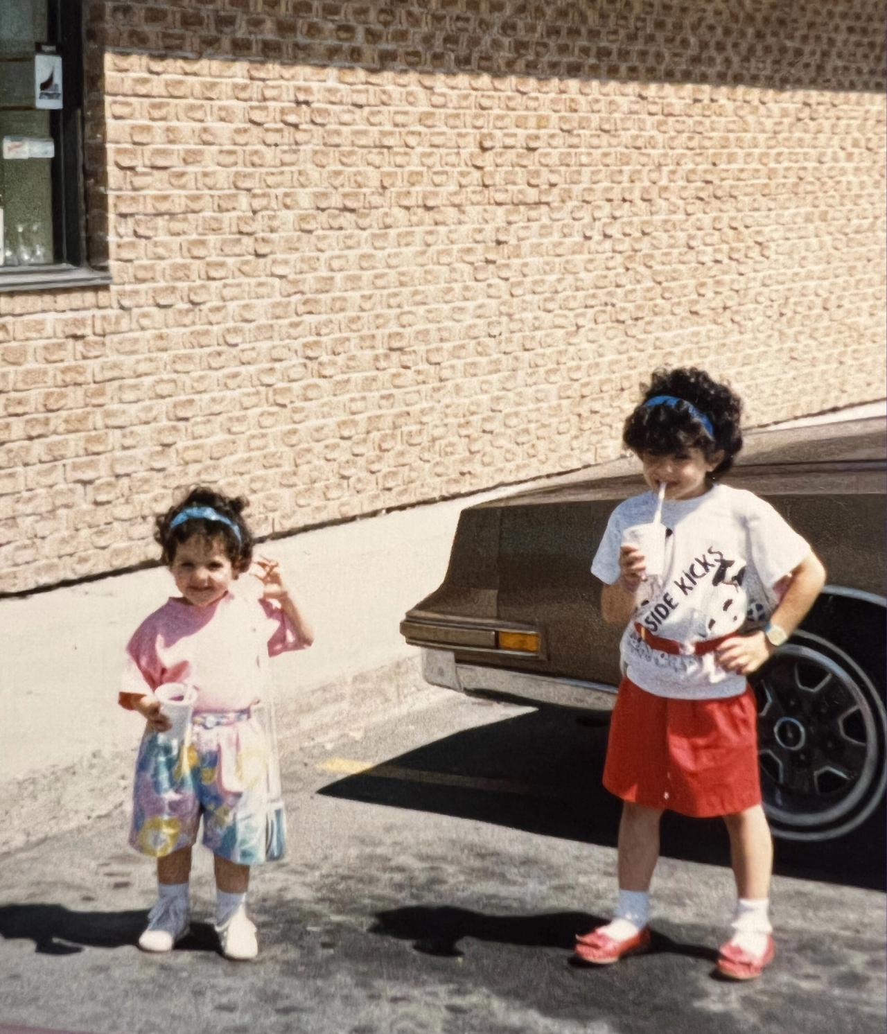 Semaan (right) and her younger sister, Laeticia, as children in Montreal. (Courtesy Céline Semaan)