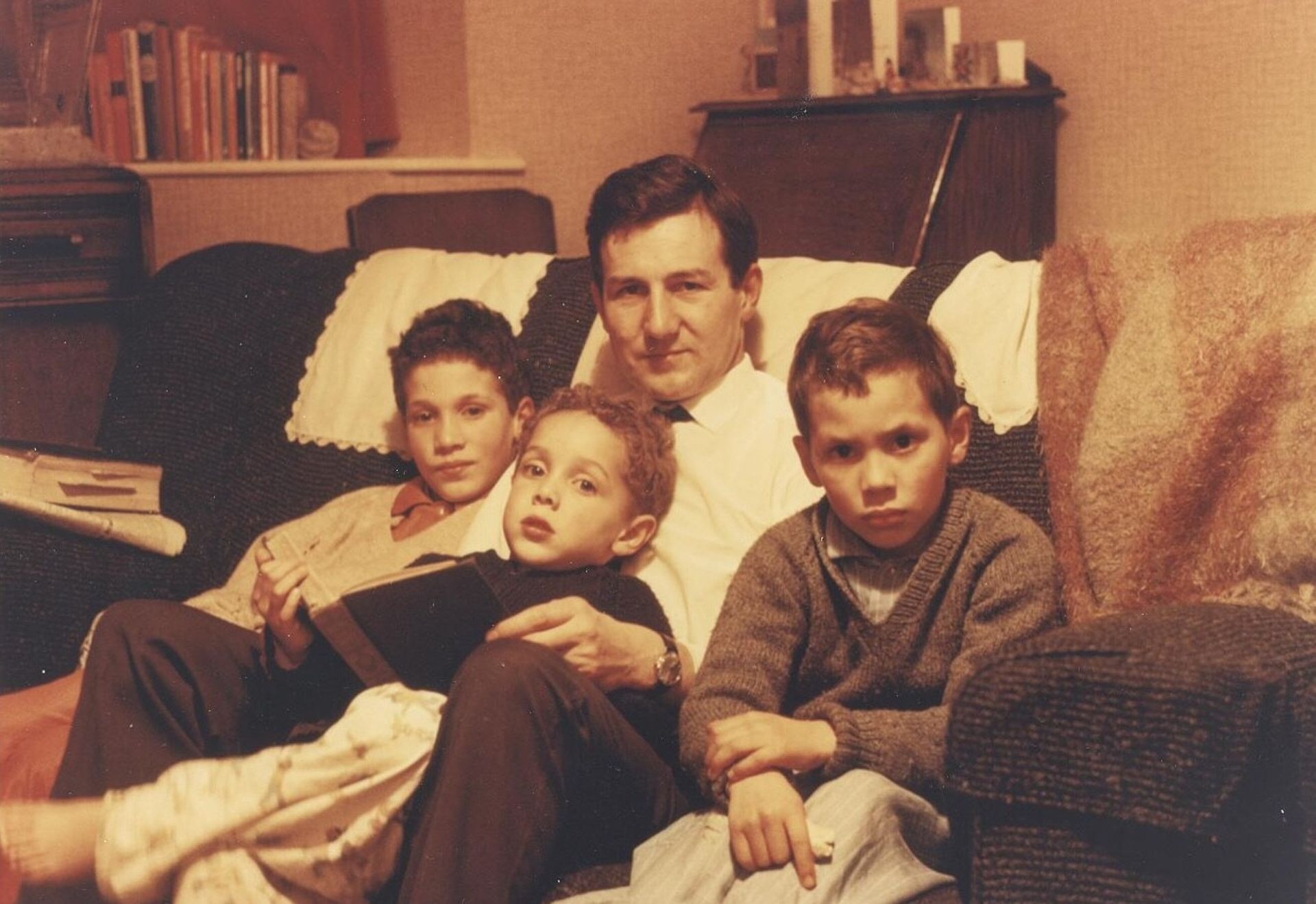 Gladwell (center) as a child with his father and brothers. (Courtesy Malcolm Gladwell)