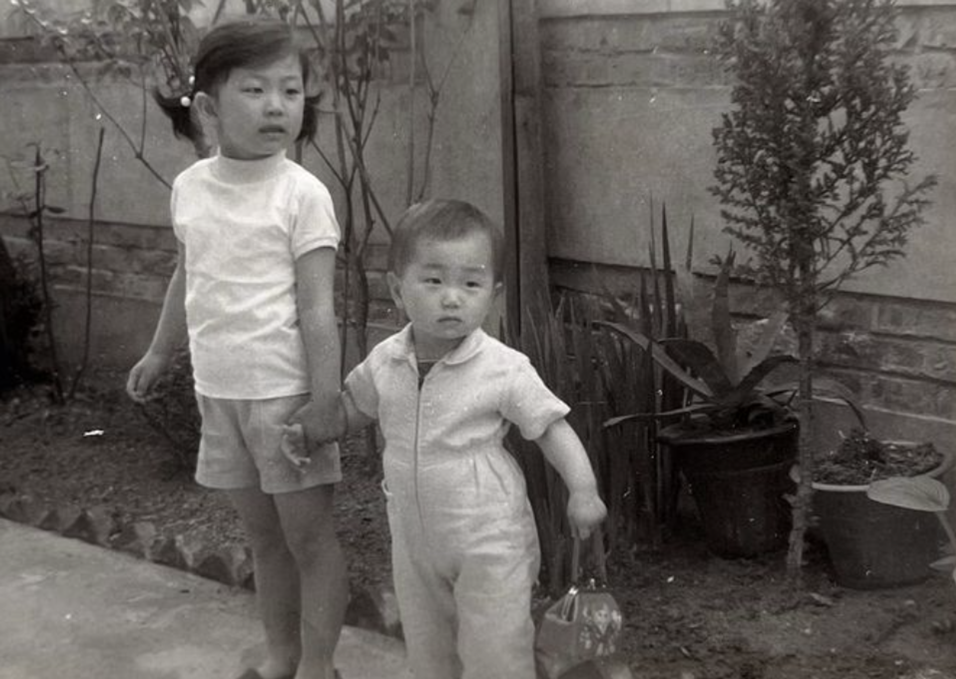 Lee (left) as a child in Seoul. (Courtesy Min Jin Lee)