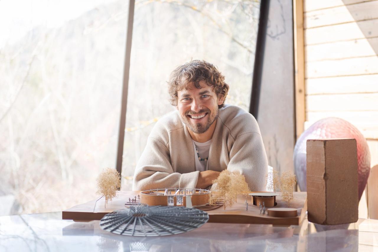 Mimran with a scale model of the Bidi Bidi Performing Arts Centre. (Photo: Cornelius Muller. Courtesy to.org)