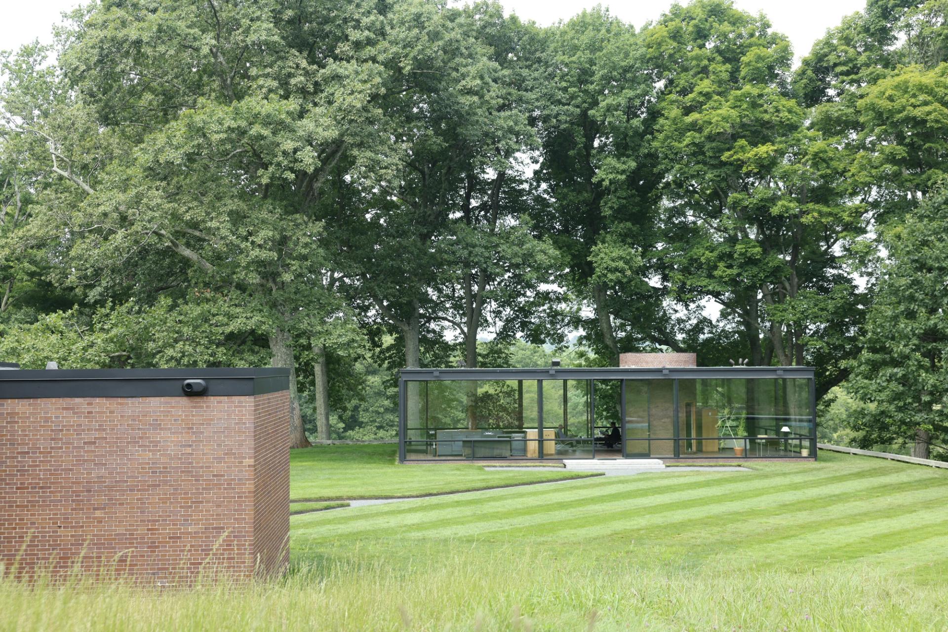 Philip Johnson’s Brick House (left) and Glass House in New Canaan, Connecticut. (Photo: Ogata for The Slowdown)