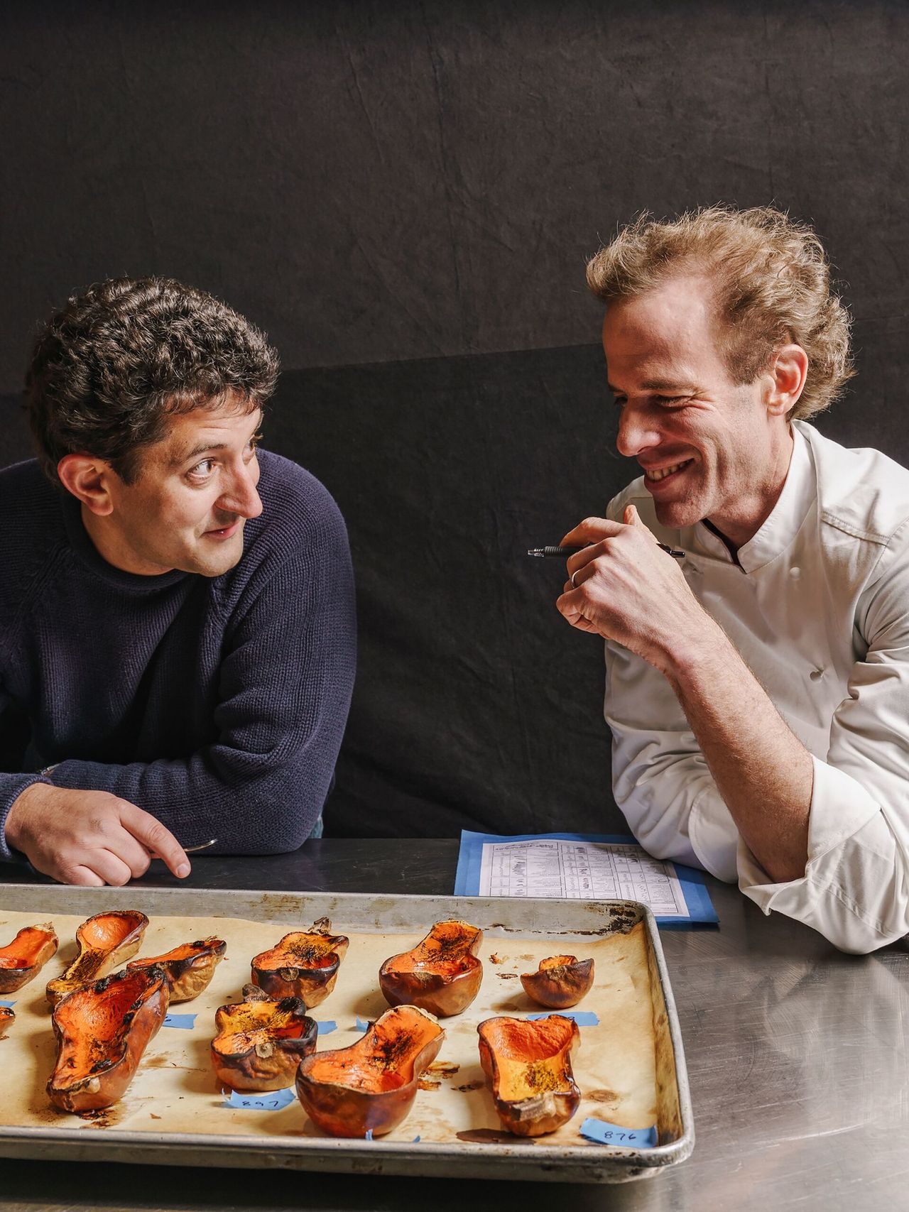 Barber (right) and Michael Mazourek (left) in 2018 with a tray of the honeynut squash they bred together under their seed company, Row 7. (Courtesy Row 7 Seed Company)