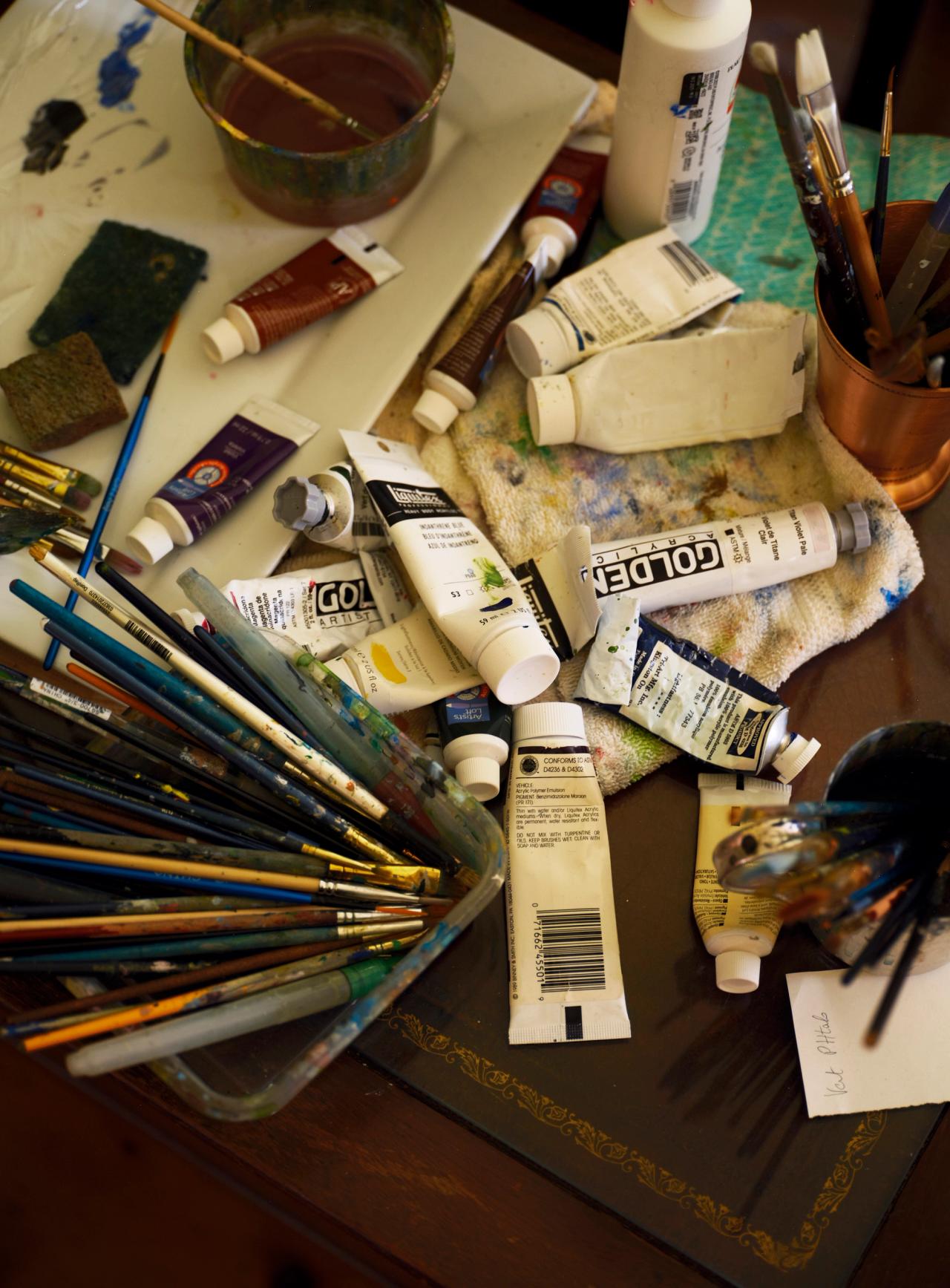 Pépin’s painting supplies in his office. (Photo: Matthew Harrington for The Slowdown)