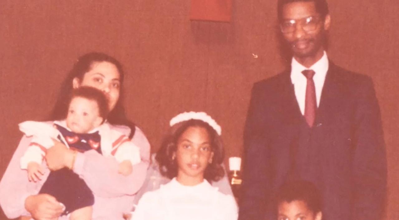 Gay (center) and her family at her first communion. (Courtesy Roxane Gay)