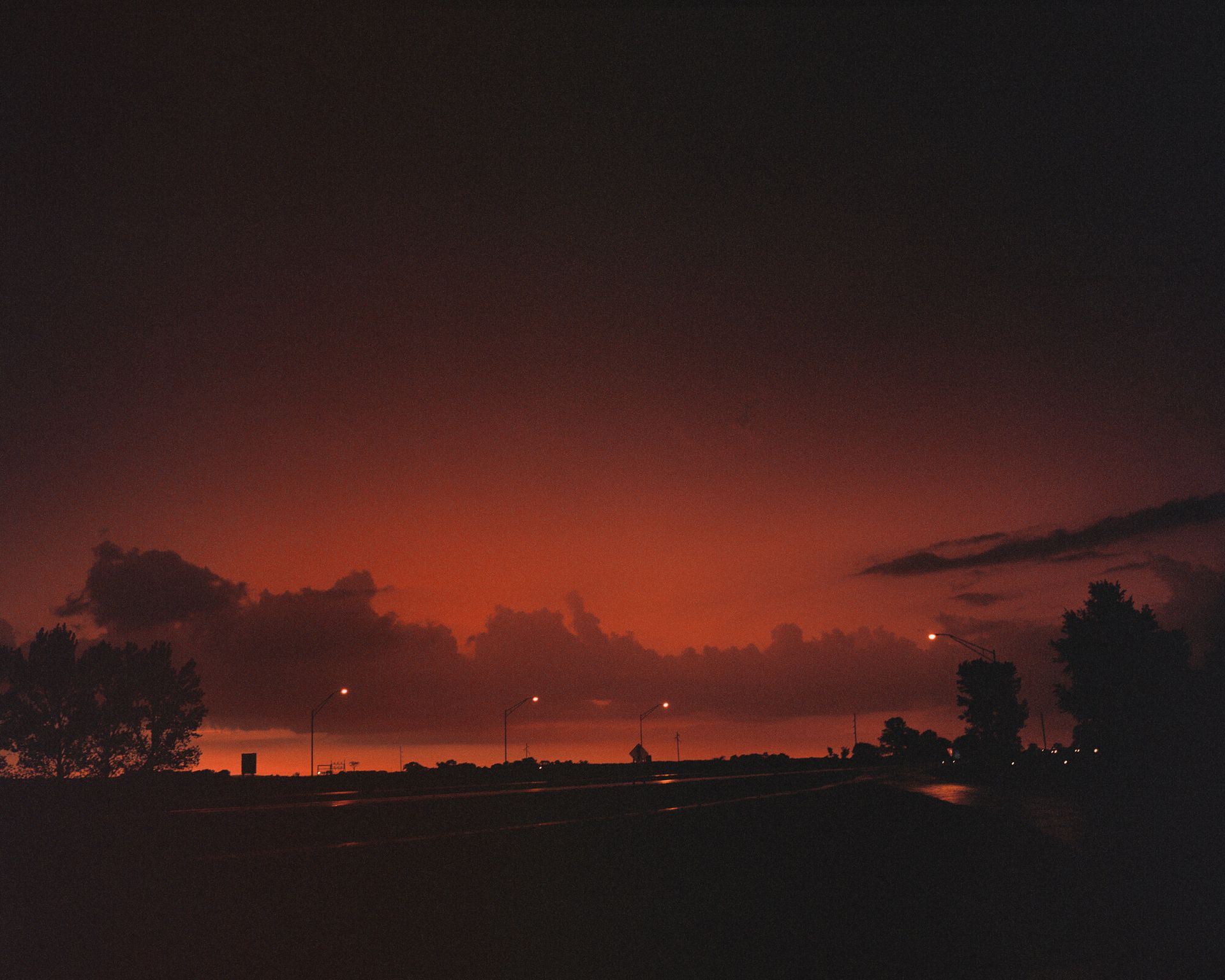 “Untitled (Tarmac), Iowa” (2016) from Bailey’s ongoing series “Son Pictures.” (Courtesy Trent Davis Bailey and Robert Koch Gallery, San Francisco)