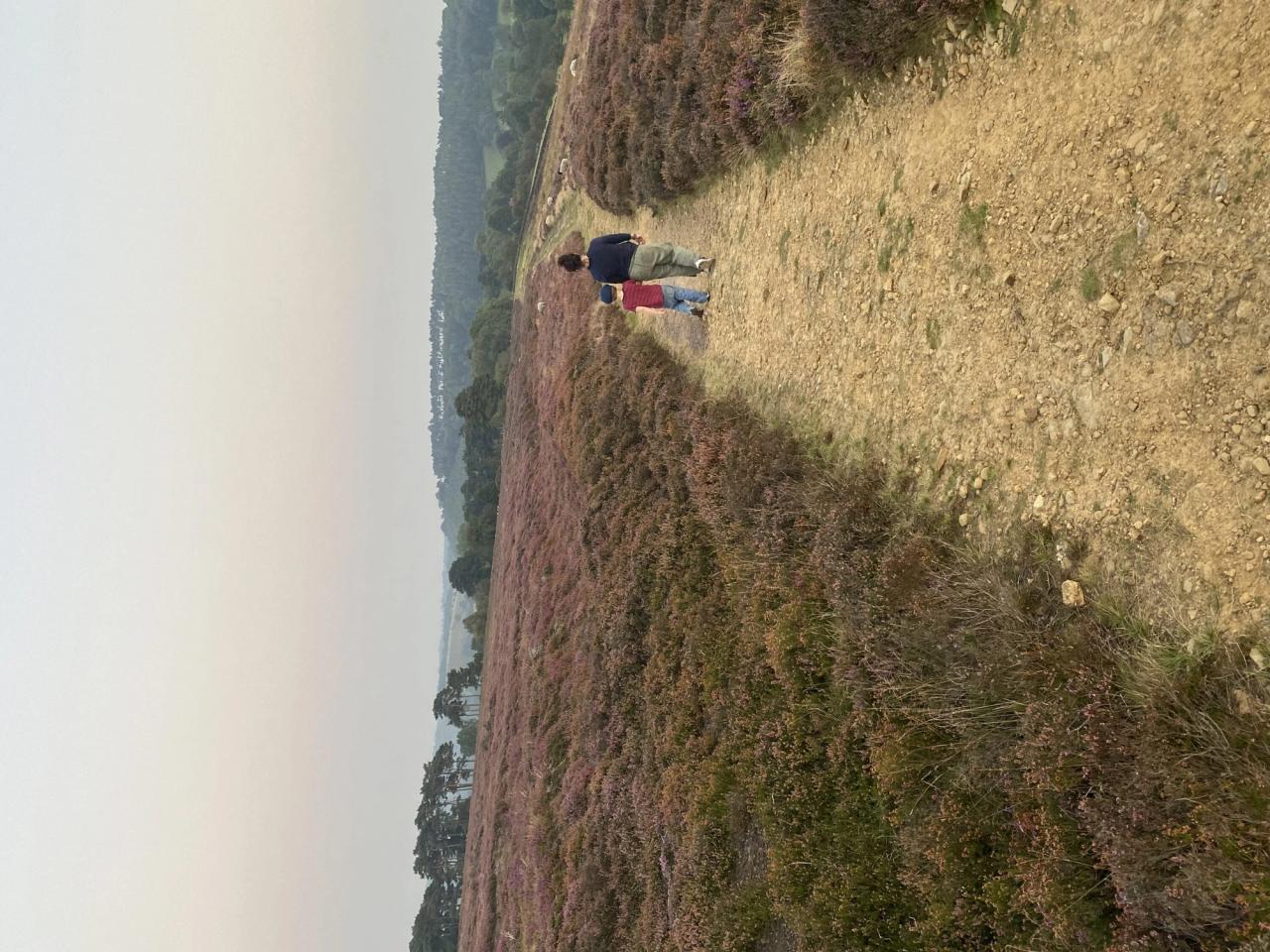 Burkeman's partner and son at a distance in the moors. (Courtesy Oliver Burkeman)