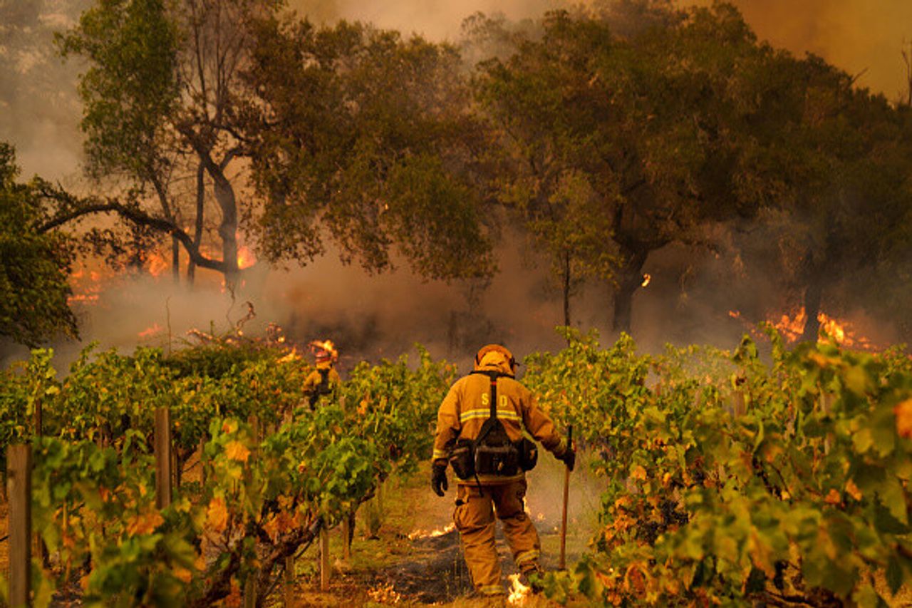 Firefighters in Deer Park, California, working to contain the Glass Fire in September 2020. (Photo: Kent Nishimura. Courtesy Getty Images)