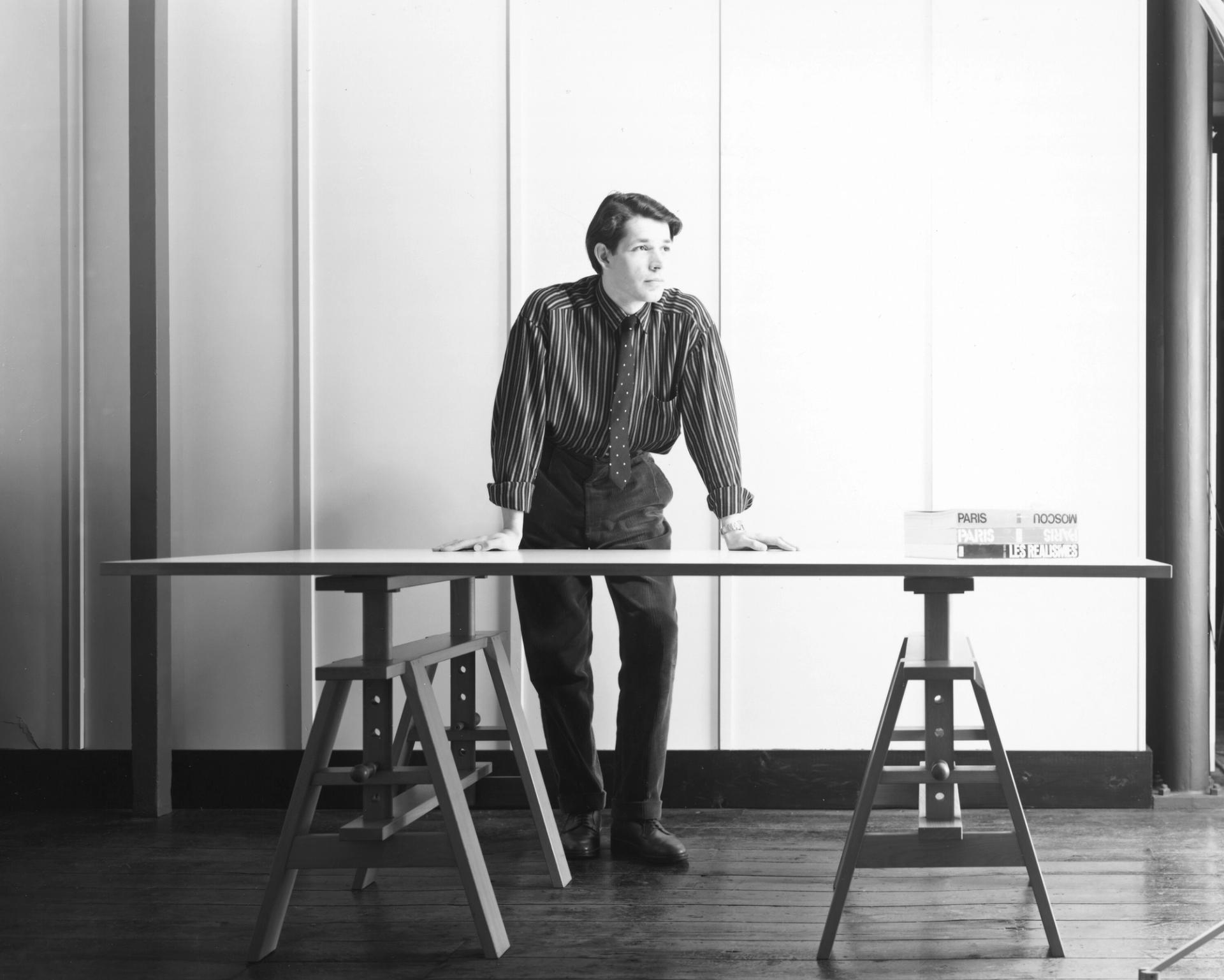 A photo of Saville at PSA Studio in London in 1983, by the photographer Trevor Key. (Courtesy Peter Saville)