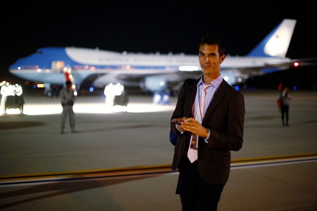 Shapiro as a young reporter, standing in front of Air Force 1. (Courtesy Ari Shapiro)