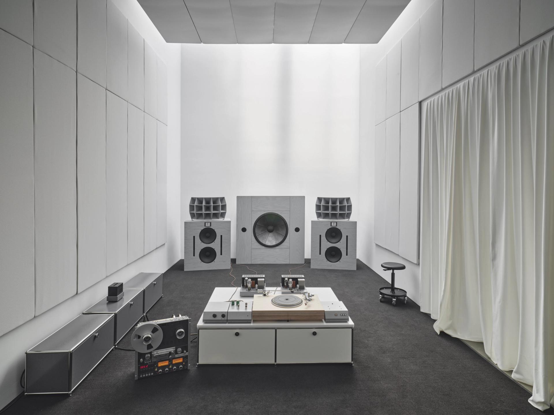 Turnbull’s “HiFi Pursuit Listening Room Dream No. 1,” a sound installation comprised of two speakers, a subwoofer, two amps and a turntable, shown as part of “The Odds are Good, the Goods are Odd,” an exhibition at Lisson Gallery in New York in August 2022. (Copyright Ojas/Courtesy Lisson Gallery)
