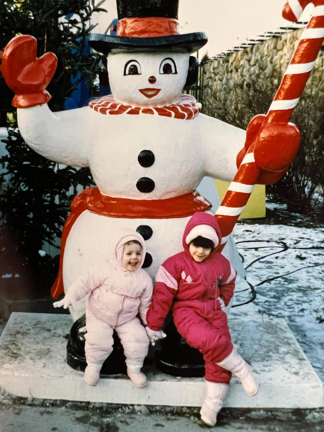 Semaan (right) and her younger sister, Laeticia, as children in Montreal. (Courtesy Céline Semaan)