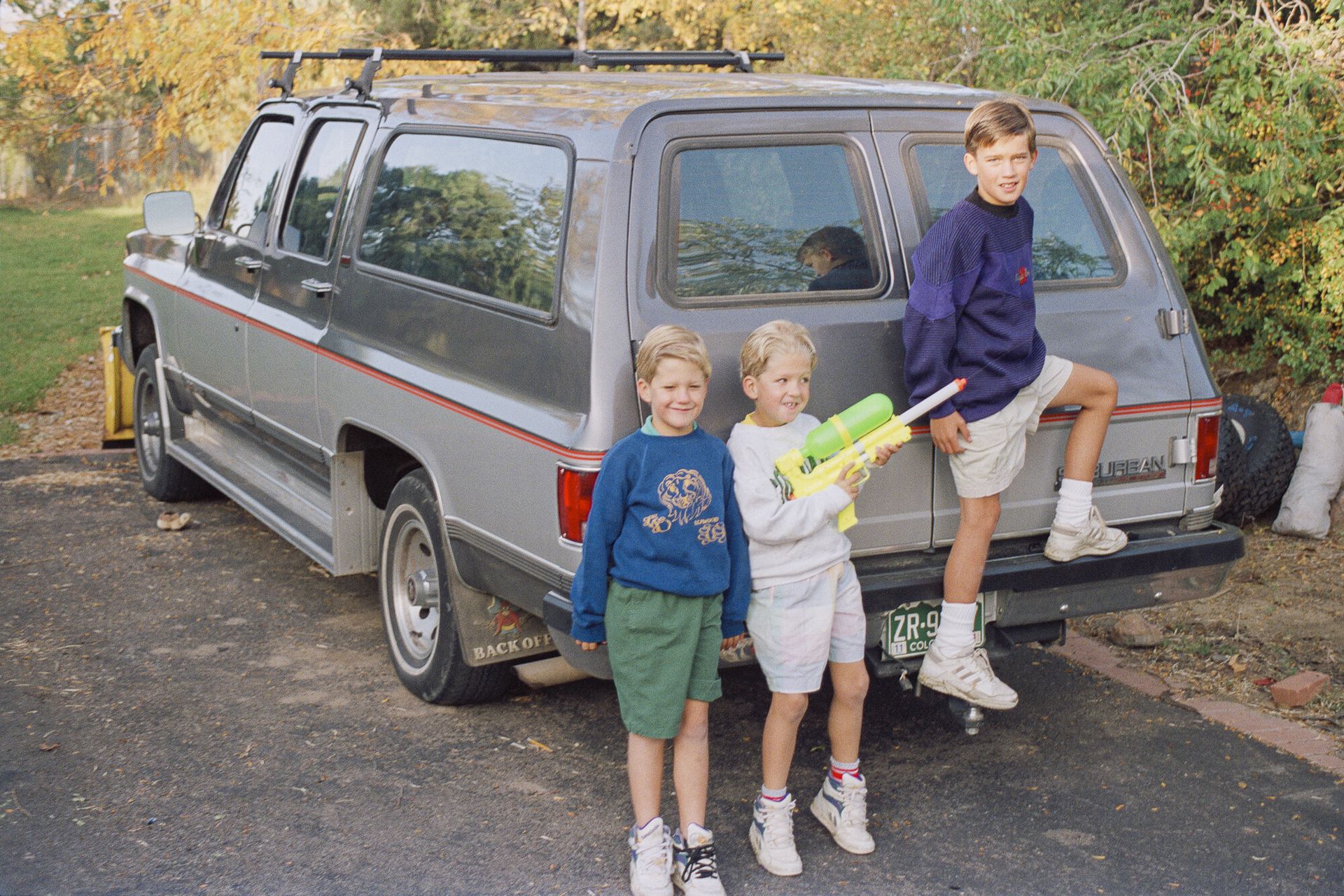Spencer (left), Trent (middle), and Brandon (right) during their upbringing.
