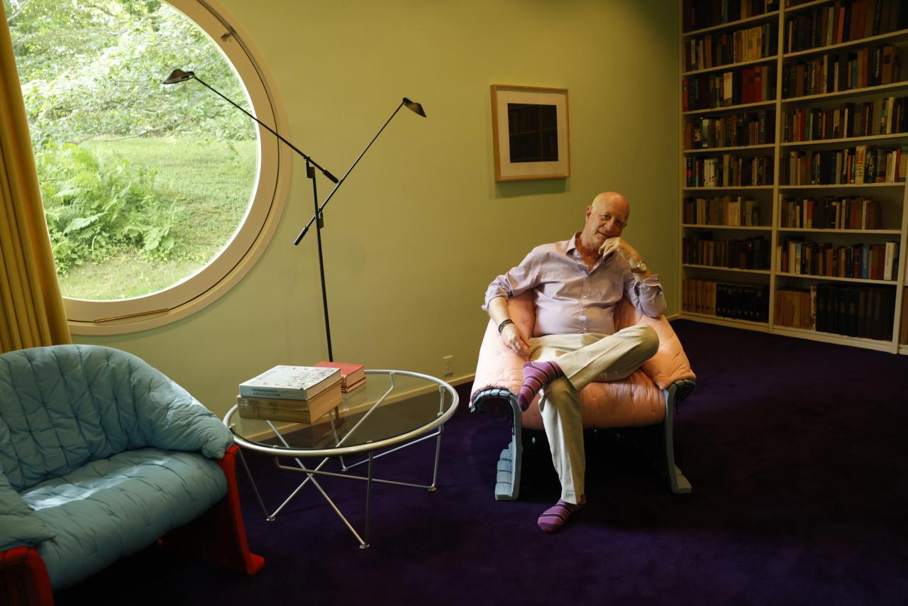 Goldberger relaxing in the library of Philip Johnson’s Brick House. (Photo: Ogata for The Slowdown)