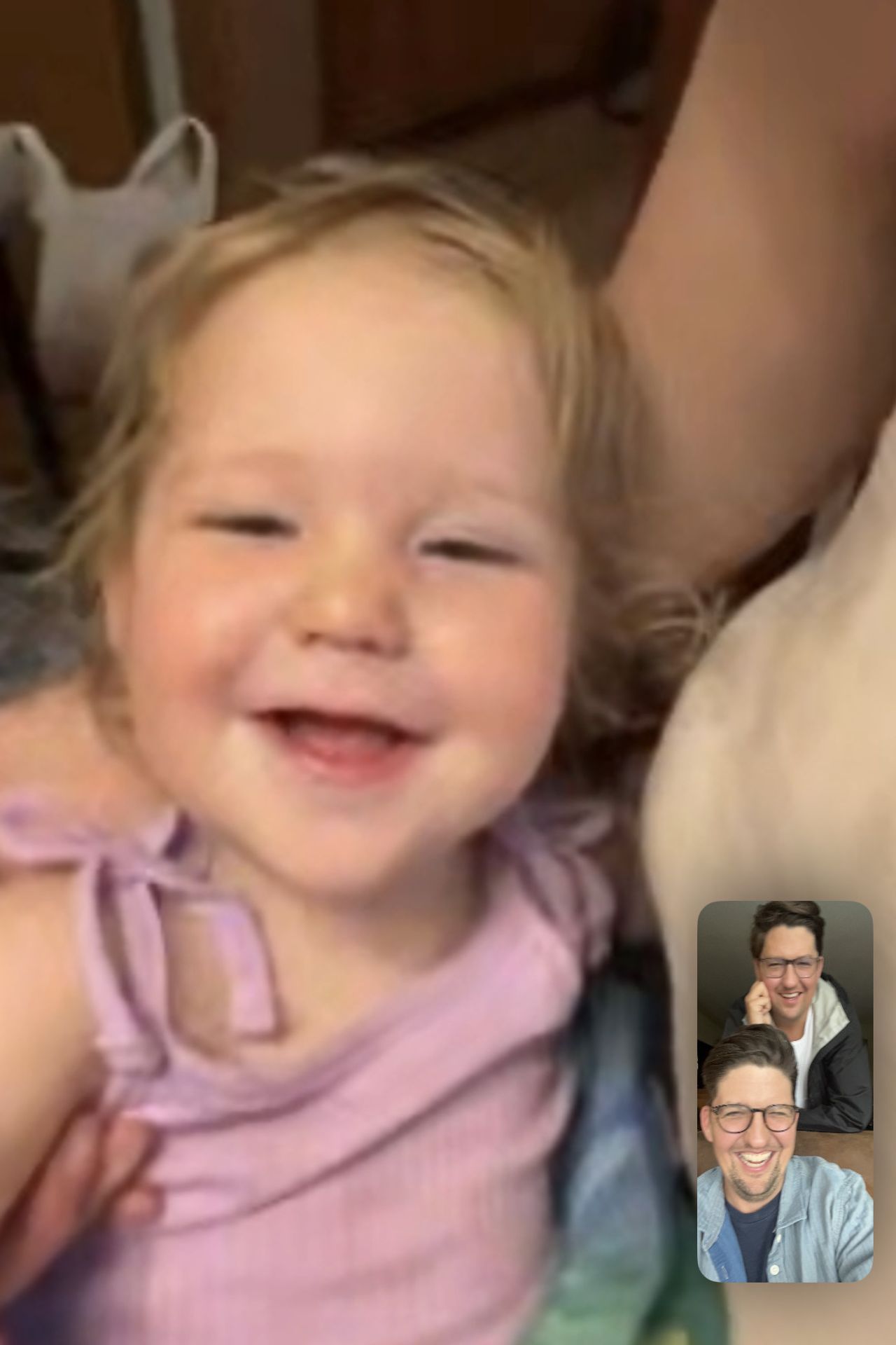 A screenshot of Trent and Spencer on a FaceTime call with Trent’s 1-year-old daughter, Audie, in July 2023.