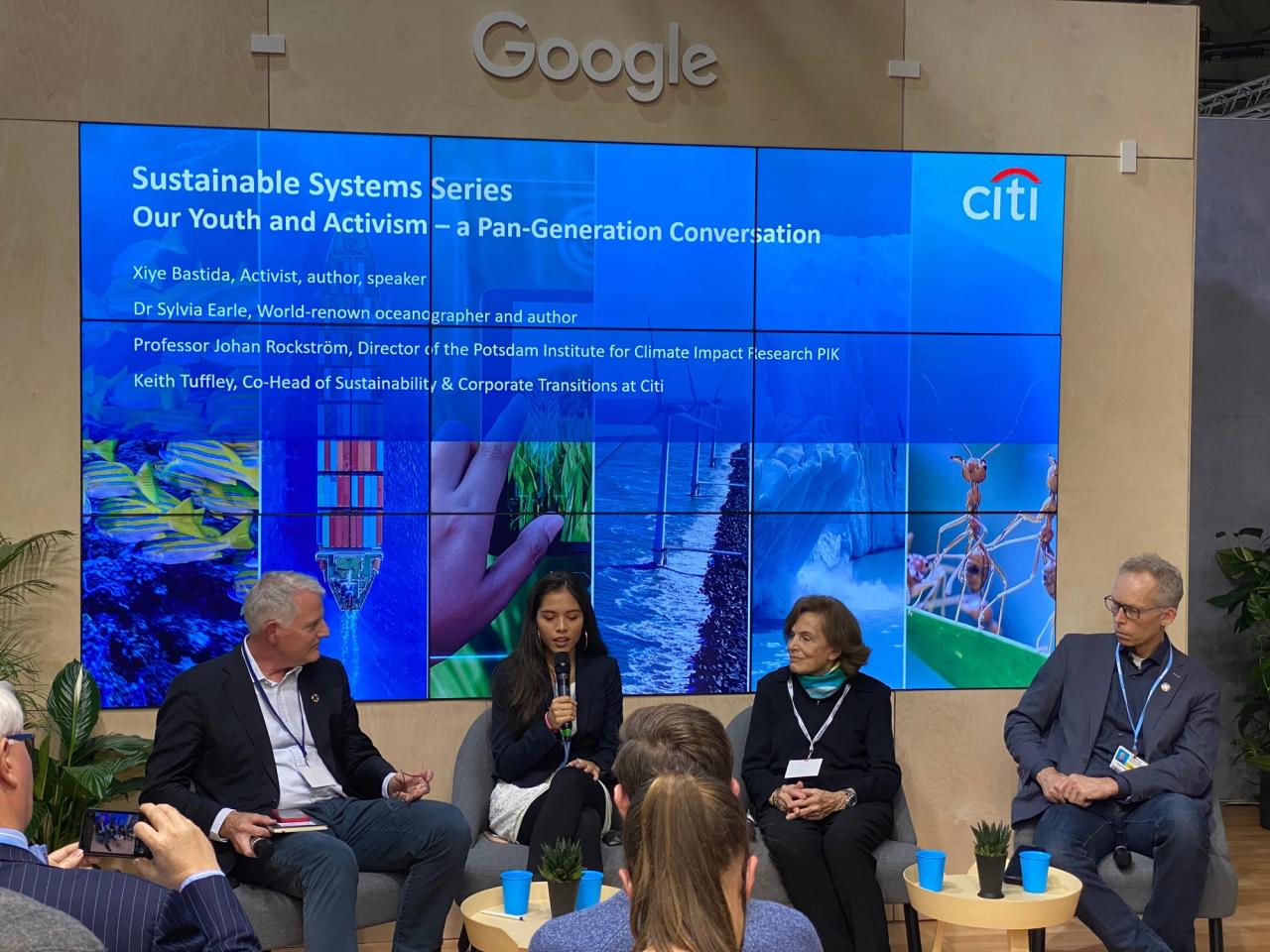 A panel held by Citi at COP26. From left, Keith Tuffley, co-head of sustainability and corporate transitions at Citi; Bastida; oceanographer and author Dr. Sylvia Earle; and Johan Rockström, director of the Potsdam Institute for Climate Impact Research. (Courtesy Xiye Bastida)