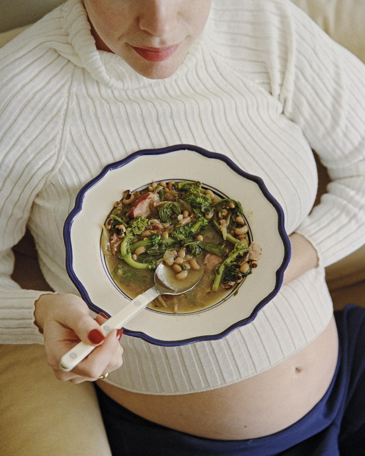 Roman with her “French Onion Beans & Greens” dish from her forthcoming cookbook, Something From Nothing. (Photo: Chris Bernabeo)