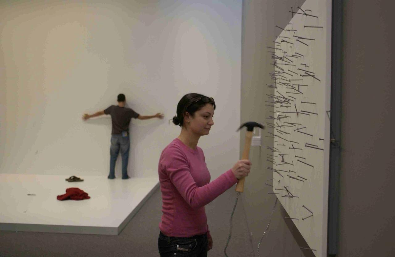 A visitor at the “Work Ethic” (2003) exhibition at the Baltimore Museum of Art. (Photo: Howard Korn. Courtesy the Baltimore Museum of Art)