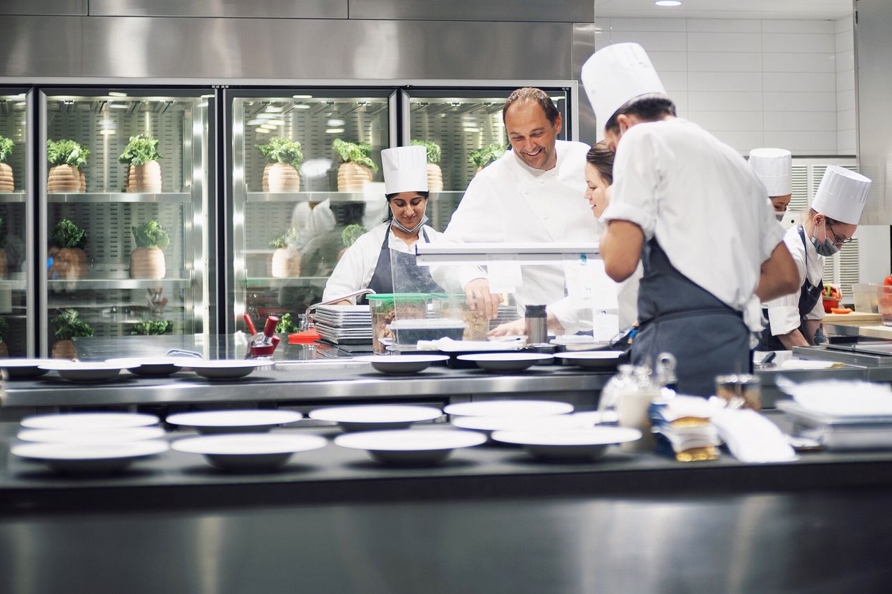 Humm and his team members in the Eleven Madison Park kitchen. (Courtesy Daniel Humm)