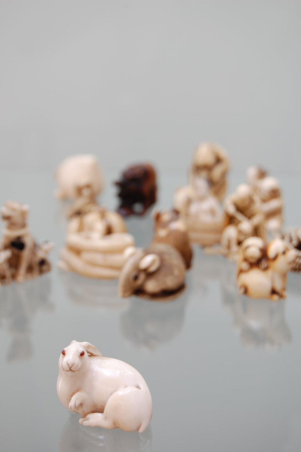 The Hare with Amber Eyes netsuke pictured among other netsuke from de Waal’s family’s collection. (Courtesy Edmund de Waal)
