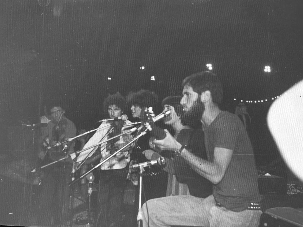 Broza at age 21, performing with a folk band at a concert in Israel. (Courtesy David Broza)