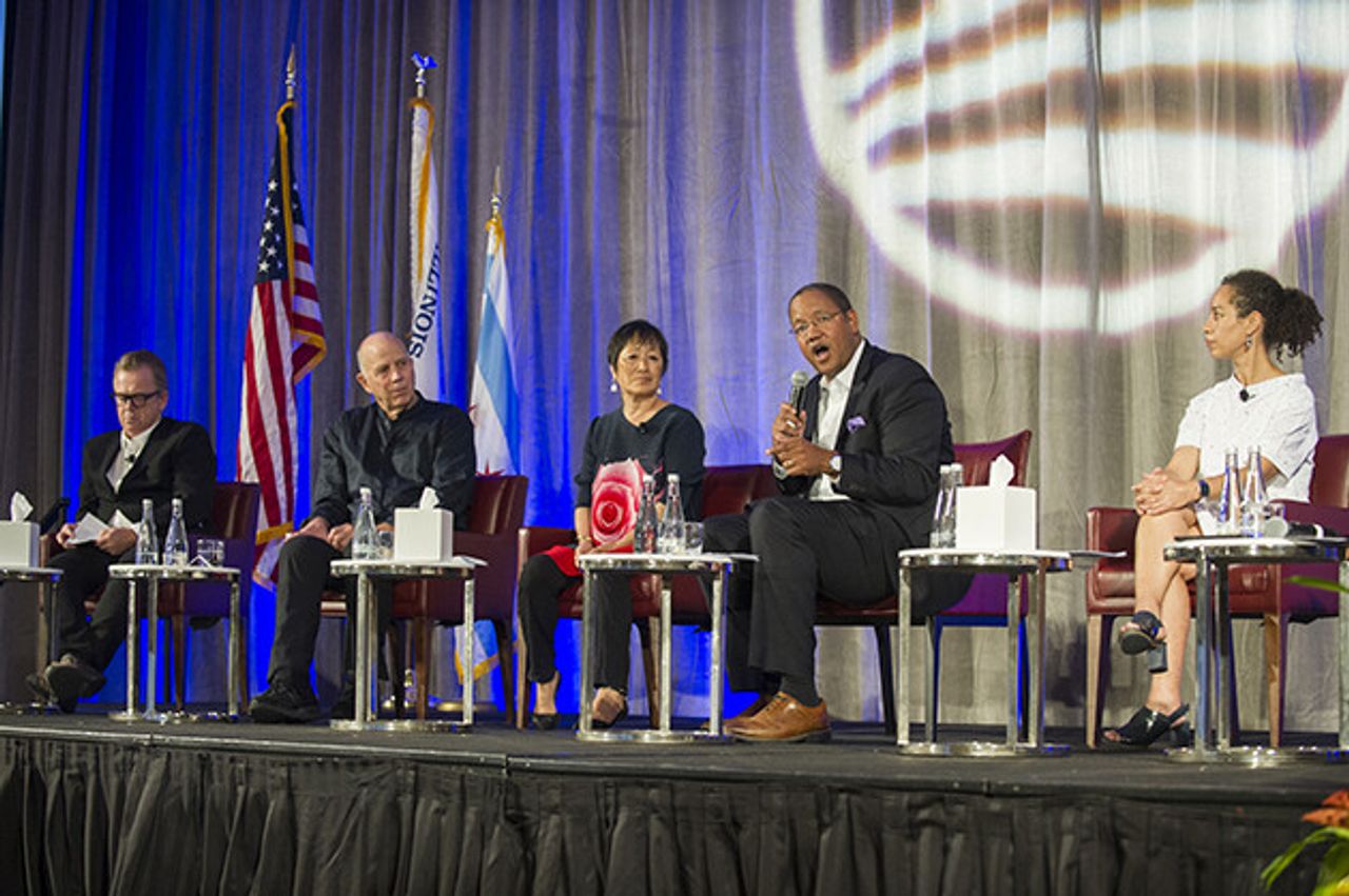 Tod Williams, Billie Tsien, and others on a stage giving a panel discussion