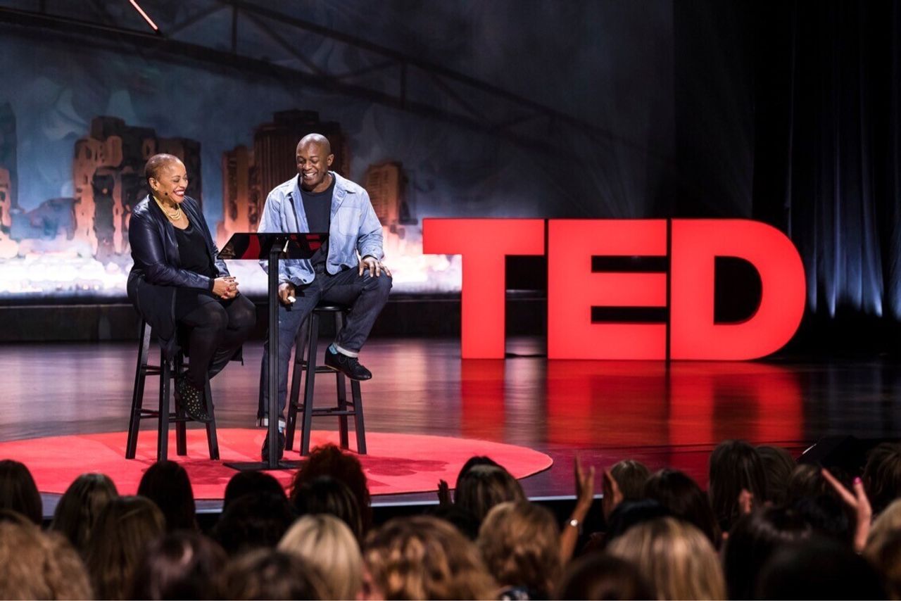 Thomas speaking with his mother, Deborah Willis, at their joint TED Talk in 2017. (Courtesy Hank Willis Thomas)