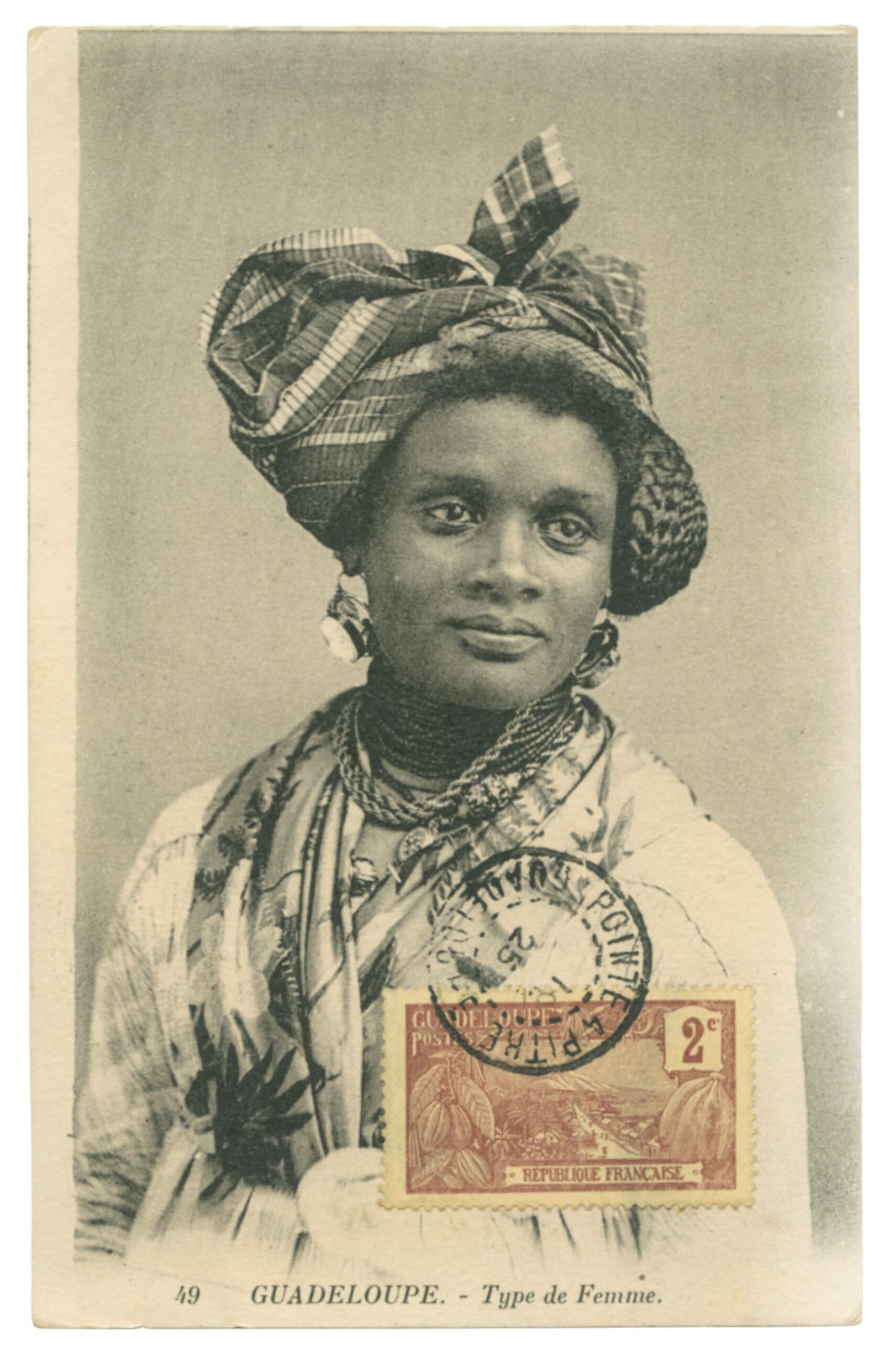 A postcard depicting a woman from Guadeloupe, as featured in Vintage Postcards from the African World (2020) by Jessica B. Harris. (Courtesy the University Press of Mississippi)