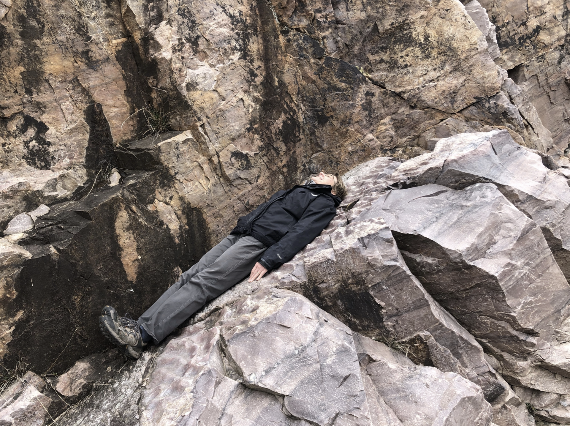 Bjornerud on a rippled bed of Baraboo Quartzite in Sauk County, Wisconsin. (Courtesy Marcia Bjornerud).