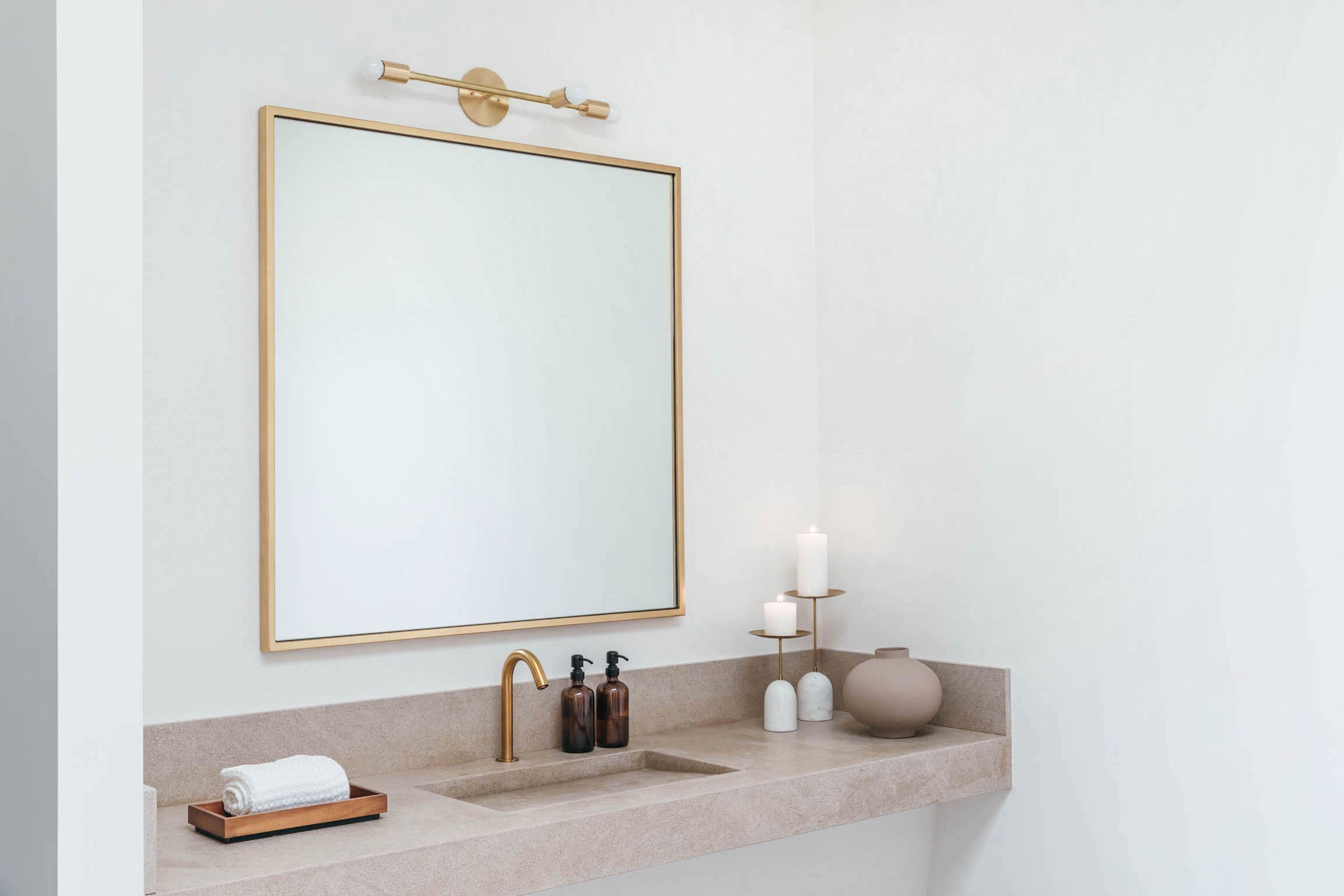Custom limestone vanity with concealed drain