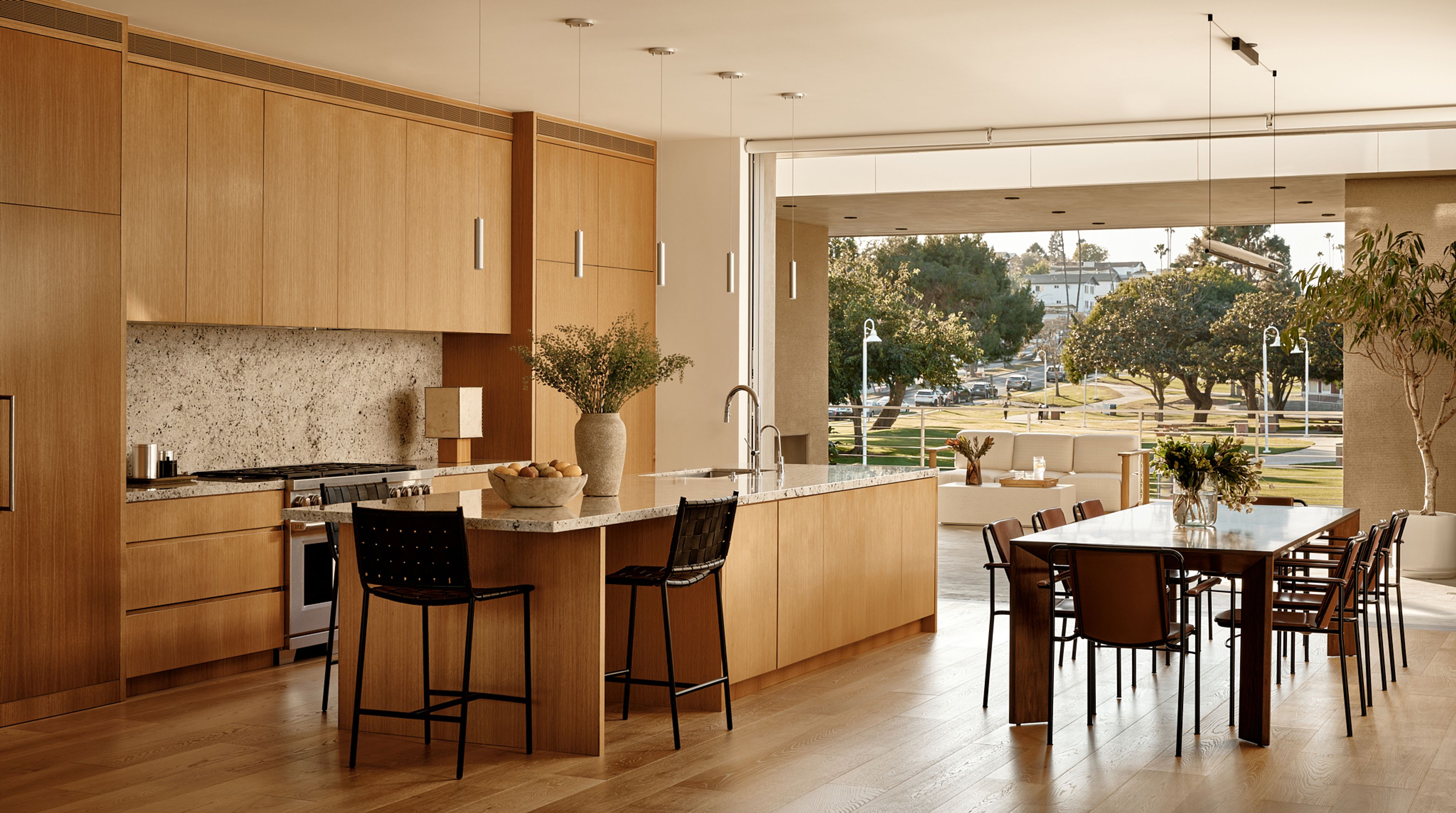 A contemporary kitchen that flows out to the back veranda